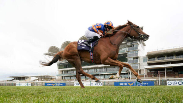 Ryan Moore guides Love to victory in the 1000 Guineas at Newmarket.